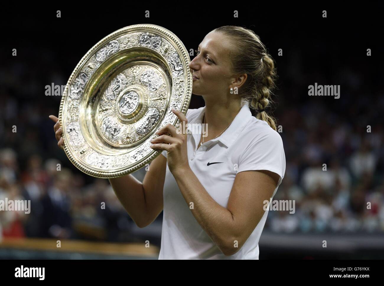 Petra Kvitova parades the winner's trophy during day thirteen of the Wimbledon Championships at the All England Lawn Tennis and Croquet Club, Wimbledon. Stock Photo