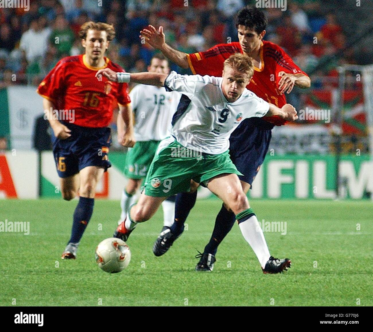 Sport football action pulling shirt hires stock photography and images