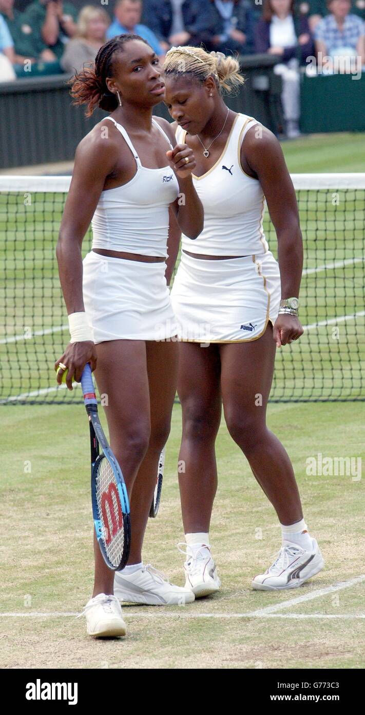 , NO COMMERCIAL USE. Serena (left) and her sister Venus Williams from the USA play their Ladies' Doubles Semi-Final less than two hours after playing each other in the Ladies' Singles Final at Wimbledon. * It is the first time in 118 years that sisters have met in the final at Wimbledon. Serena won in straight sets 7:6/6:3. Their doubles opponents were Anna Kournikova from Russia and Chanda Rubin from America. Stock Photo