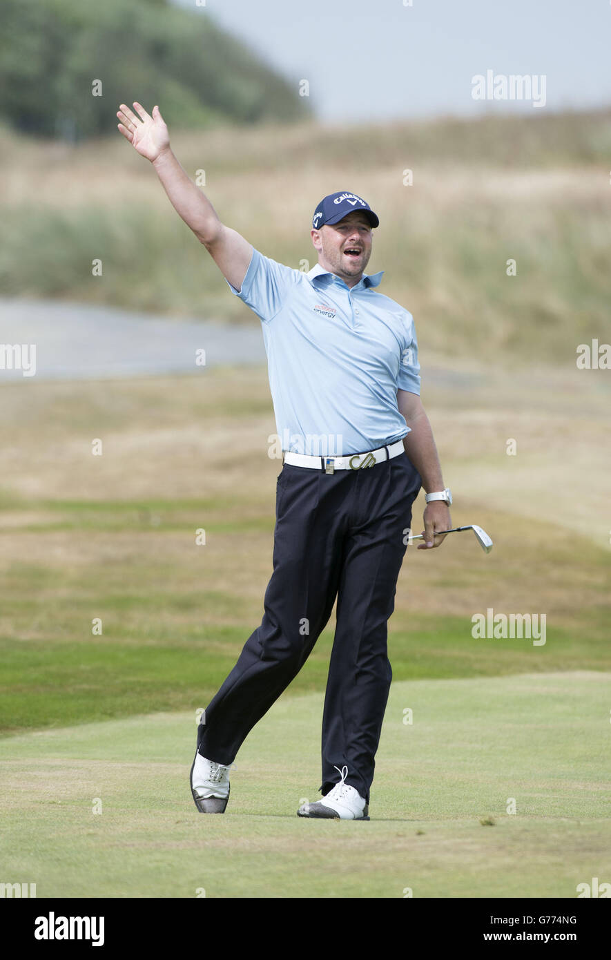 Craig Lee warns the public that he has fired his approach right at the 13th hole during day three of the Aberdeen Asset Management Scottish Open at Royal Aberdeen, Aberdeen. Stock Photo