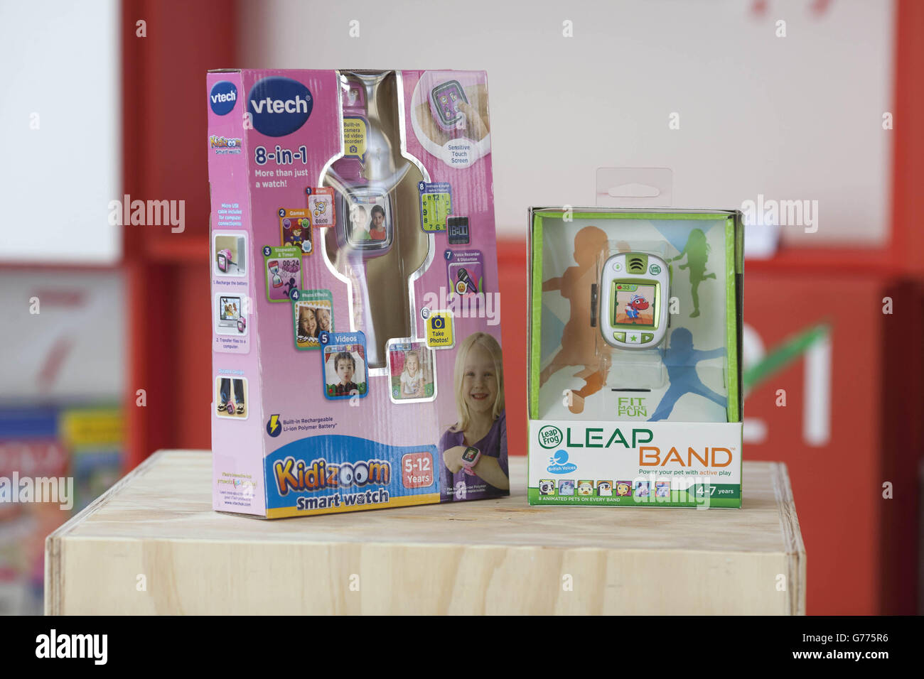 VTech Kiddizoom Smart Watch and Leapfrog Leap Band Green on display during the Argos Christmas Preview in London. Stock Photo