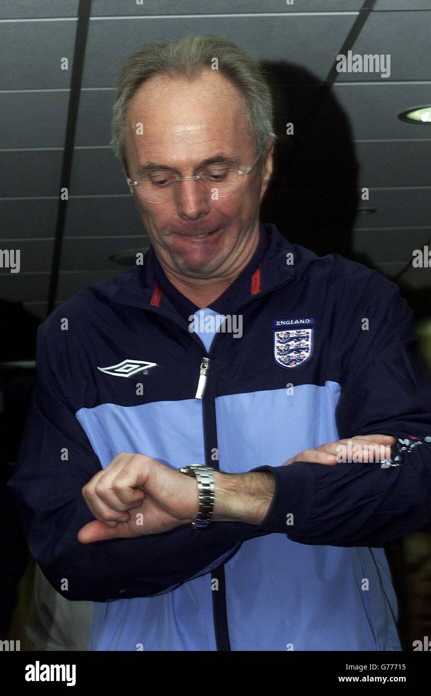 England Manager Sven Goran Eriksson checks his watch as he leaves the ...