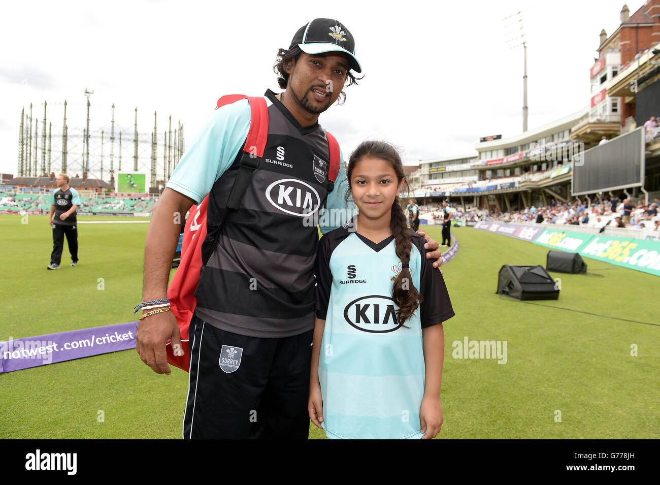 Cricket - NatWest T20 Blast - Surrey v Somerset - Kia Oval. Surrey's (left) with match day mascot Inaaya Mahmood Stock Photo