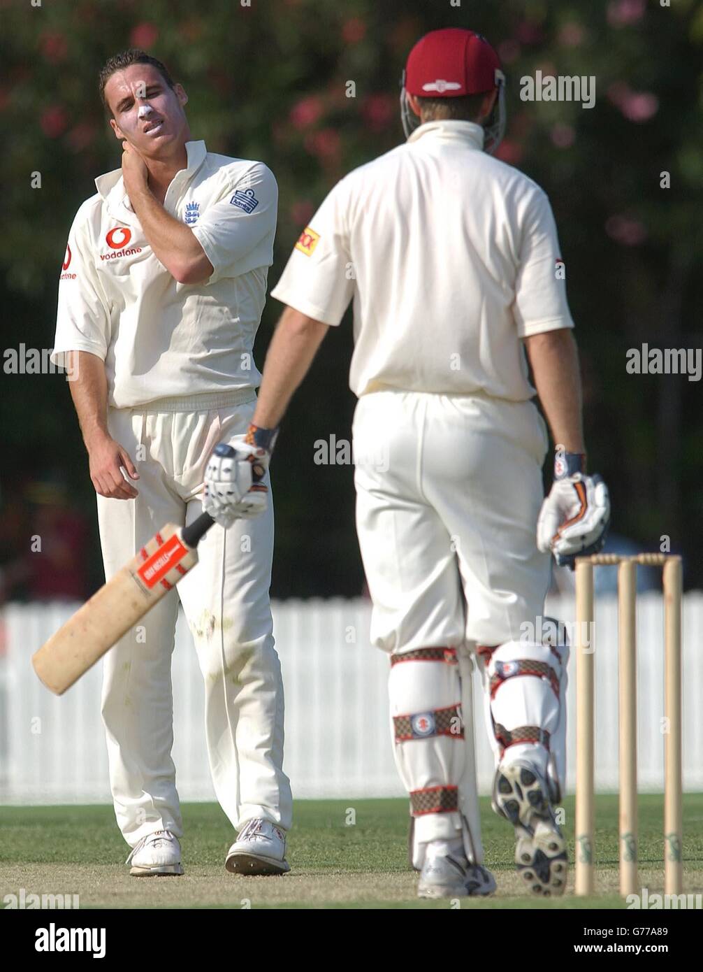 England bowler Simon Jones is hit for 4 runs by Queensland batsman