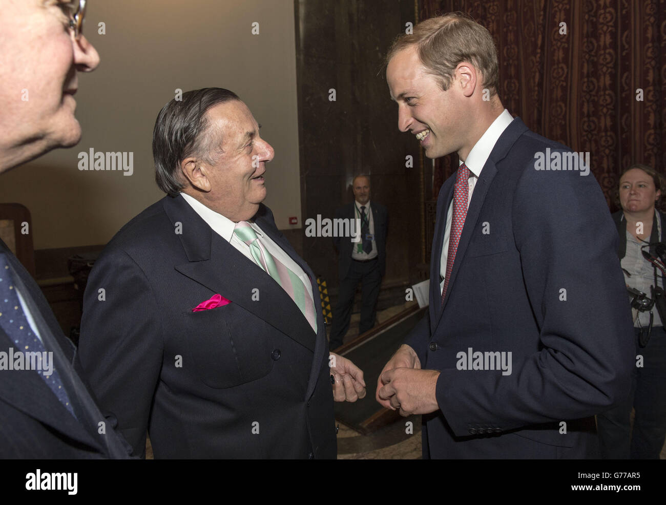 The Duke of Cambridge meets Barry Humphries at an unveiling of a statute in honour of Captain Matthew Flinders, the first cartographer to circumnavigate Australia and identify it as a continent, at Australia House, London. Stock Photo