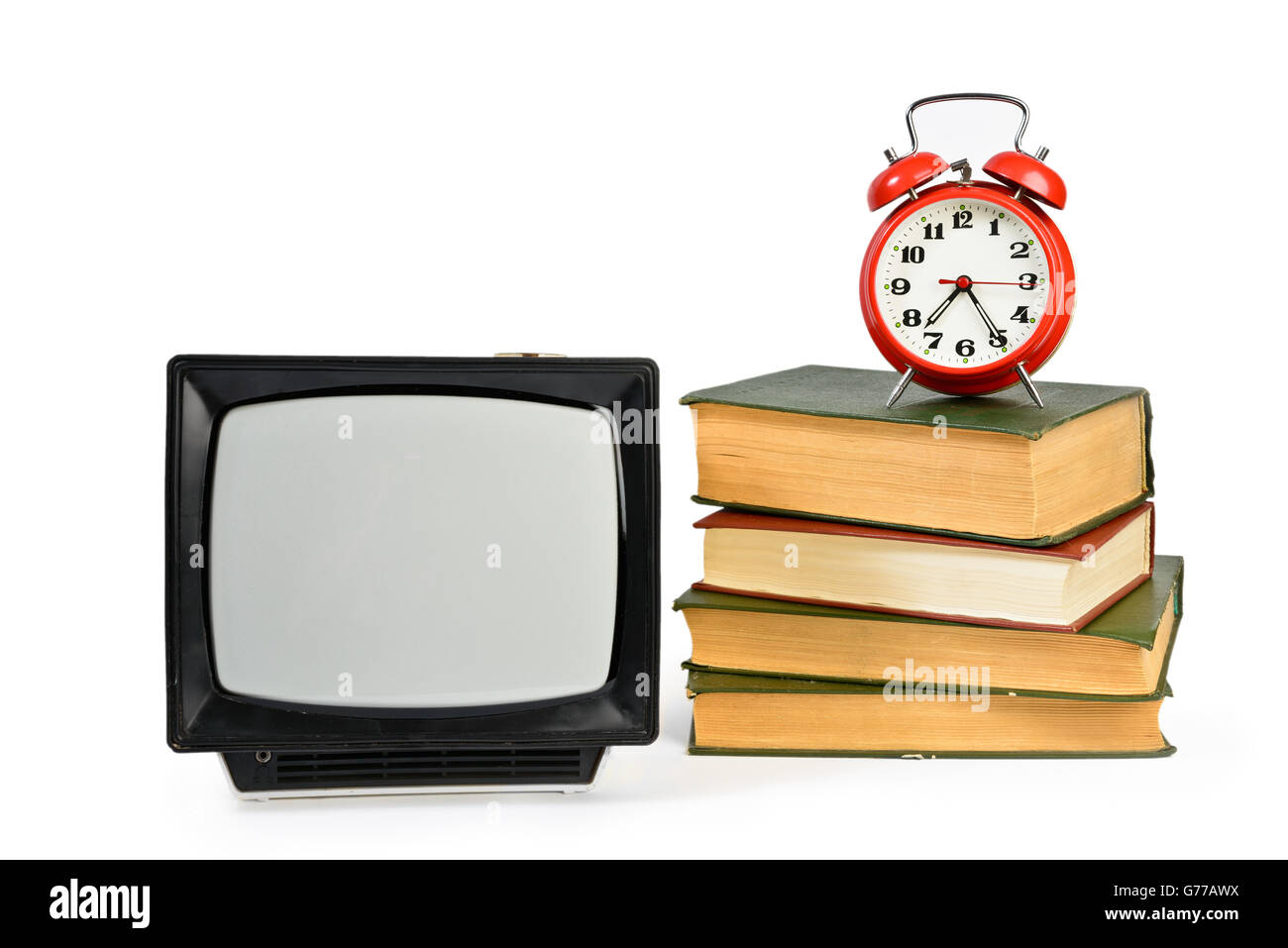 Vintage analog portable TV, some old books and retro alarm clock  isolated on white Stock Photo
