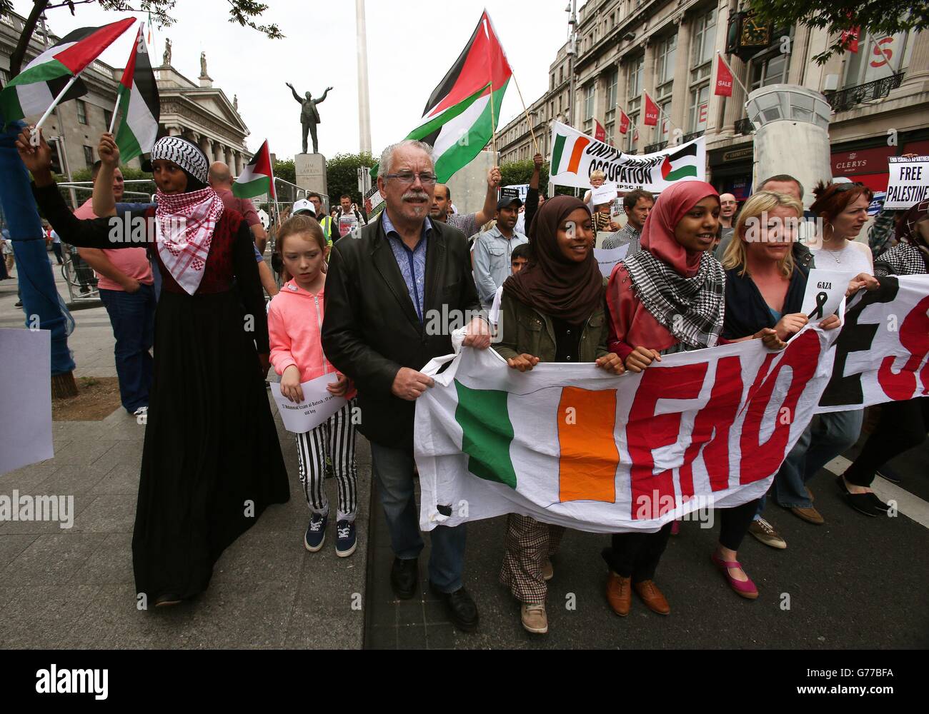 Artist Robert Ballagh takes part in a protest march through Dublin city centre to call for an end to Israeli military action in Gaza and 'justice and freedom' for Palestine. Stock Photo