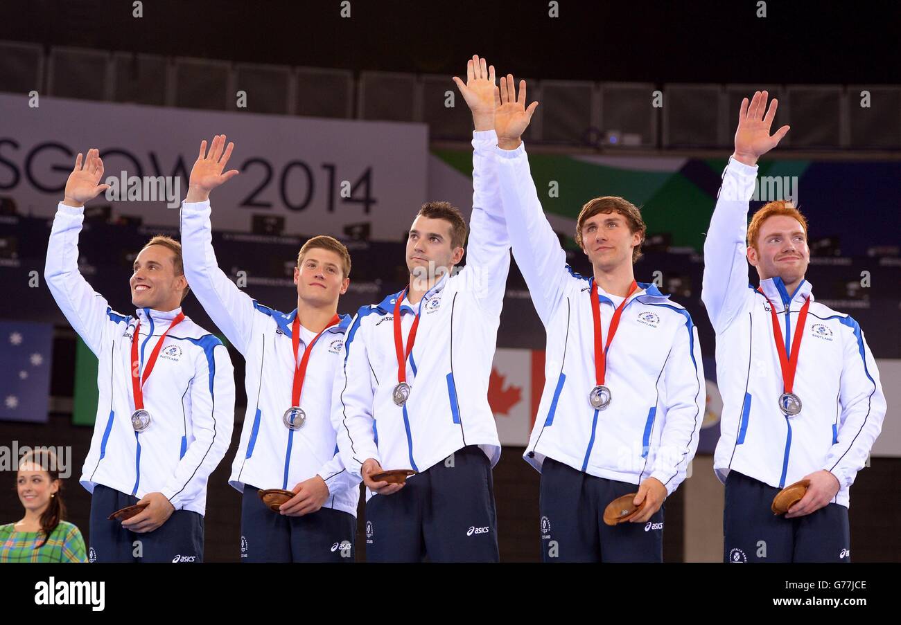 Silver medal winners Scotland's (left to right) Daniel Keatings, Frank Baines, Adam Cox, Liam Davie and Daniel Purvis on the podium following the Men's Artistic Gymnastic's Team Final and Individual Qualification at the SSE Hydro, during the 2014 Commonwealth Games in Glasgow. Stock Photo