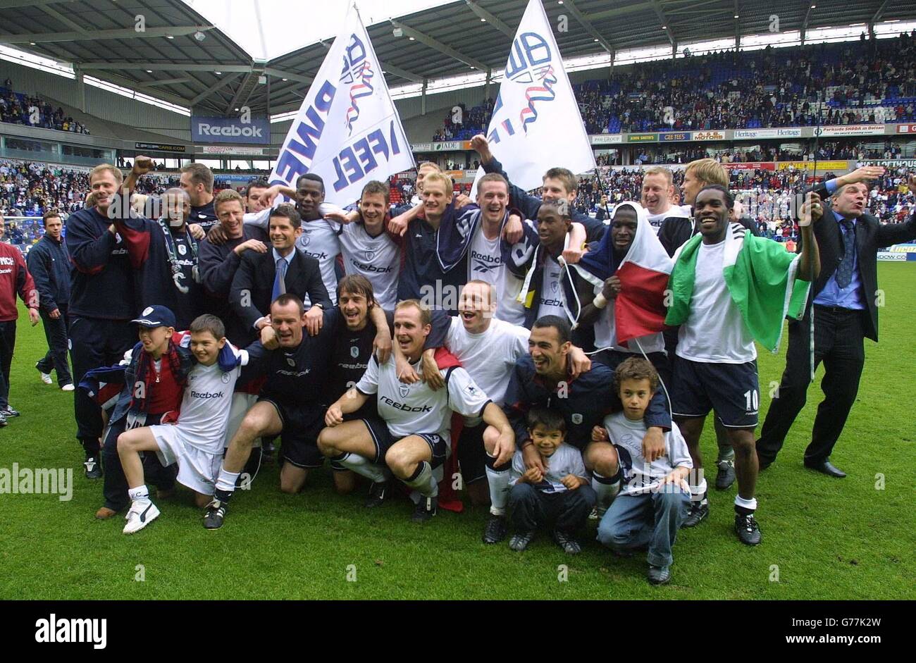 Bolton Wanderers playes celebrate their Premiership survival after victory against Middlesbrough after A Barclaycard Premiership match at Bolton's Reebok Stadium. Stock Photo