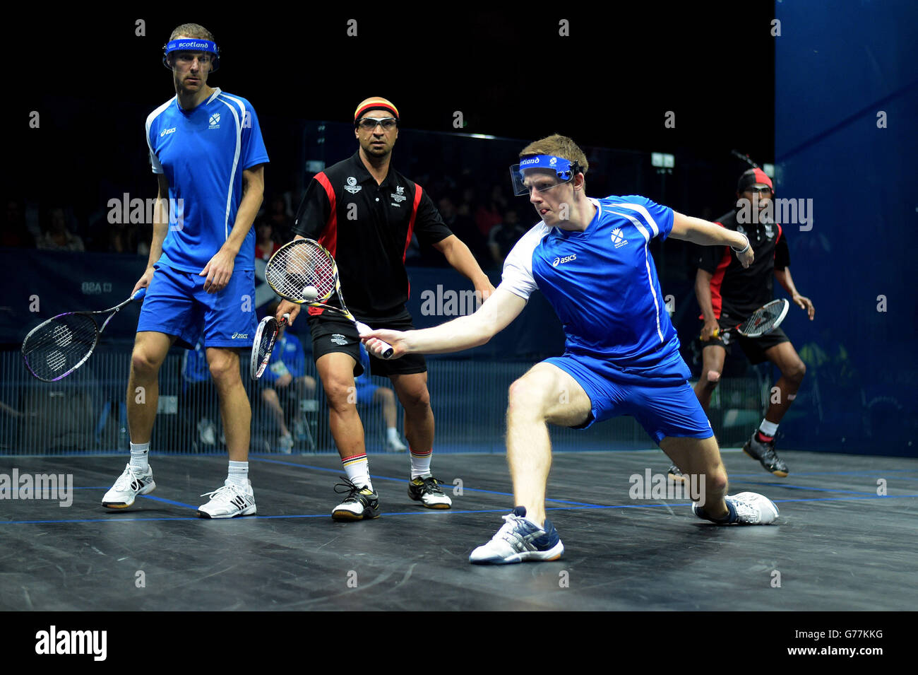Team Scotland's Stuart Crawford (left) and Greg Lobban during their men's doubles pool match against Papua New Guinea at Scotstoun Sports Campus, during the 2014 Commonwealth Games in Glasgow. Stock Photo