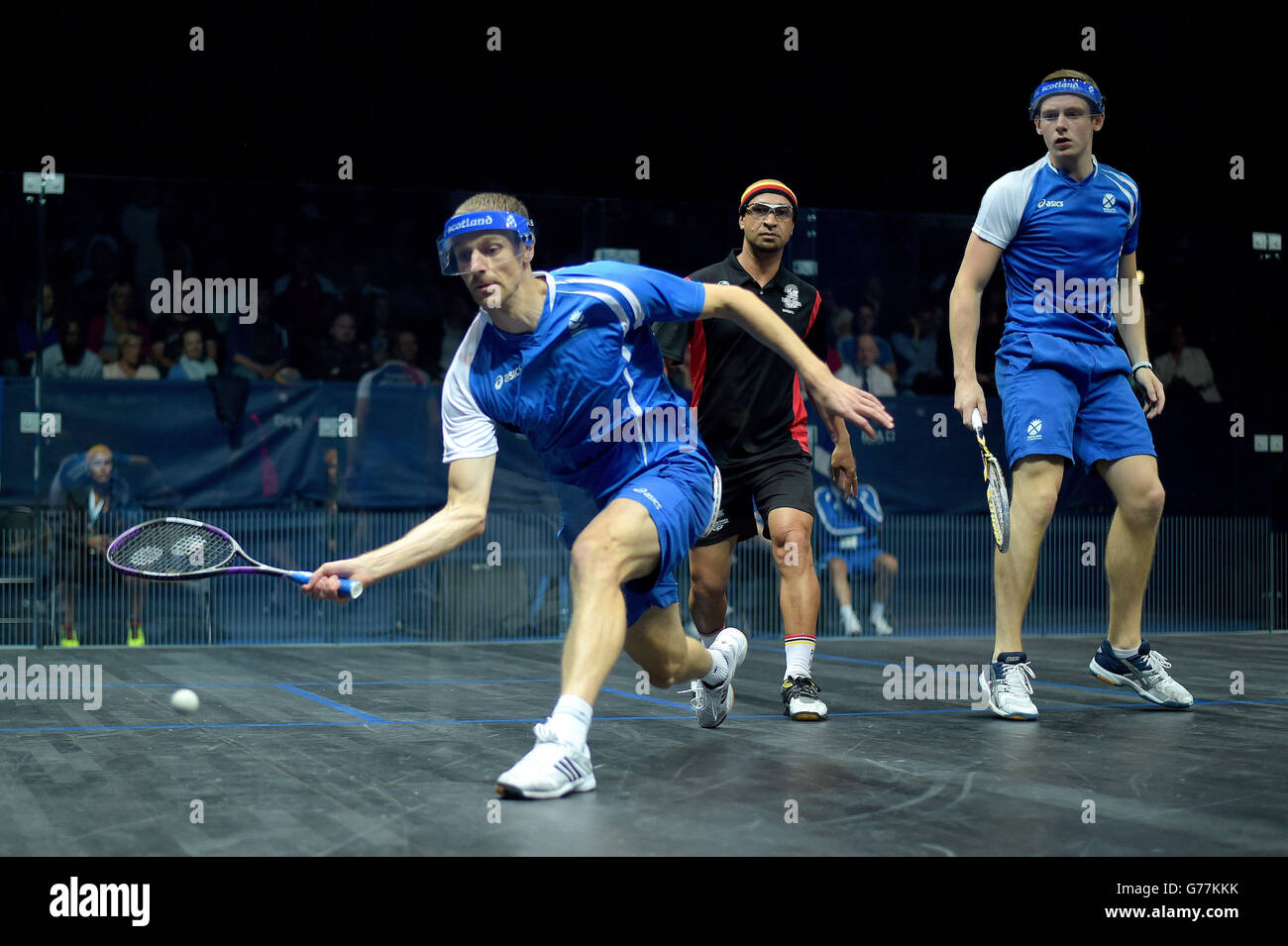 Team Scotland's Stuart Crawford (left) and Greg Lobban during their men's doubles pool match against Papua New Guinea at Scotstoun Sports Campus, during the 2014 Commonwealth Games in Glasgow. Stock Photo