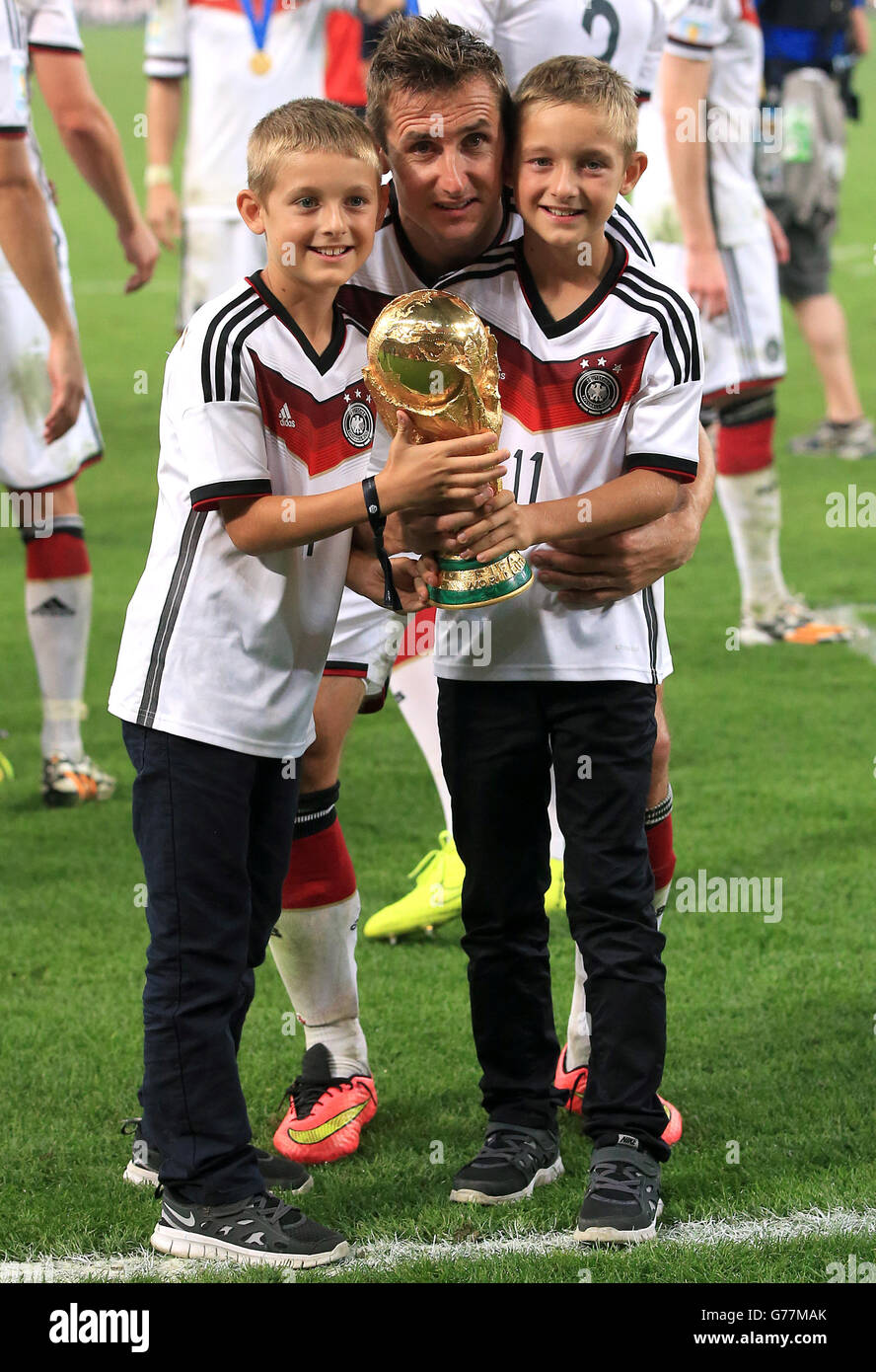Soccer - FIFA World Cup 2014 - Final - Germany v Argentina - Estadio do Maracana. Germany's Miroslav Klose celebrates winning the World Cup final with the trophy Stock Photo