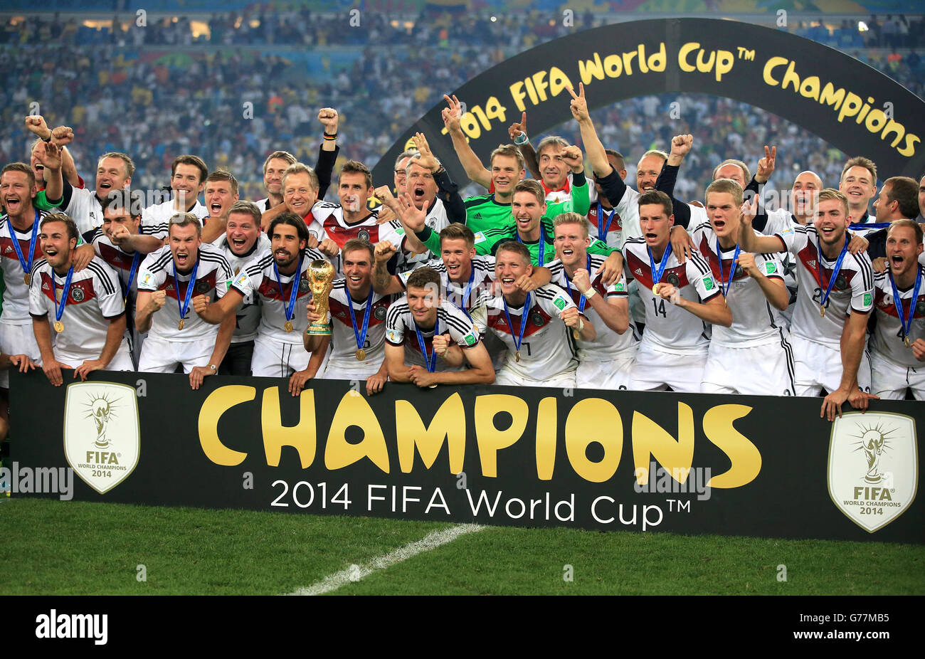 Soccer - FIFA World Cup 2014 - Final - Germany v Argentina - Estadio do Maracana. Germany celebrate winning the World Cup final with the trophy Stock Photo