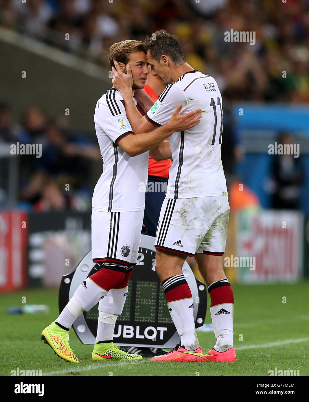Soccer - FIFA World Cup 2014 - Final - Germany v Argentina - Estadio do Maracana. Germany's Miroslav Klose embraces team-mate Mario Gotze as he comes on to replace him Stock Photo