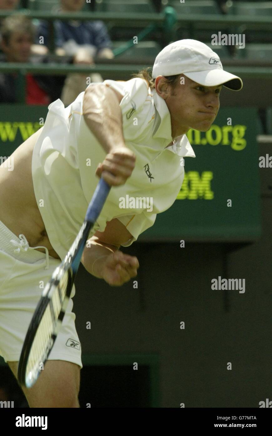 Andy Roddick from the USA in action against Davide Sangunetti of Italy at the All England Lawn Tennis Championships in Wimbledon. Stock Photo