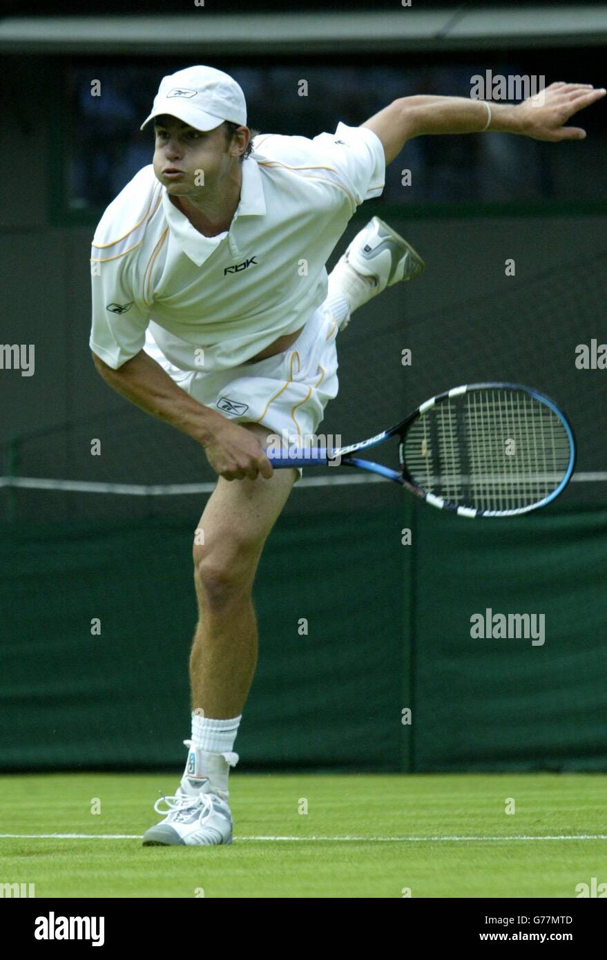 , NOT FOR USE ON MOBILE PHONES Andy Roddick from the USA in action against Davide Sangunetti of Italy at the All England Lawn Tennis Championships in Wimbledon. Stock Photo