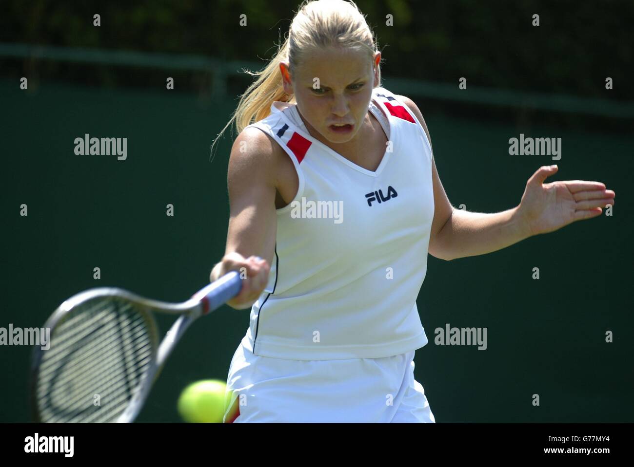 Jelena Dokic of Serbia Montenegro in action against Britain's Elena Baltacha at the All England Lawn Tennis Championships in Wimbledon. Stock Photo