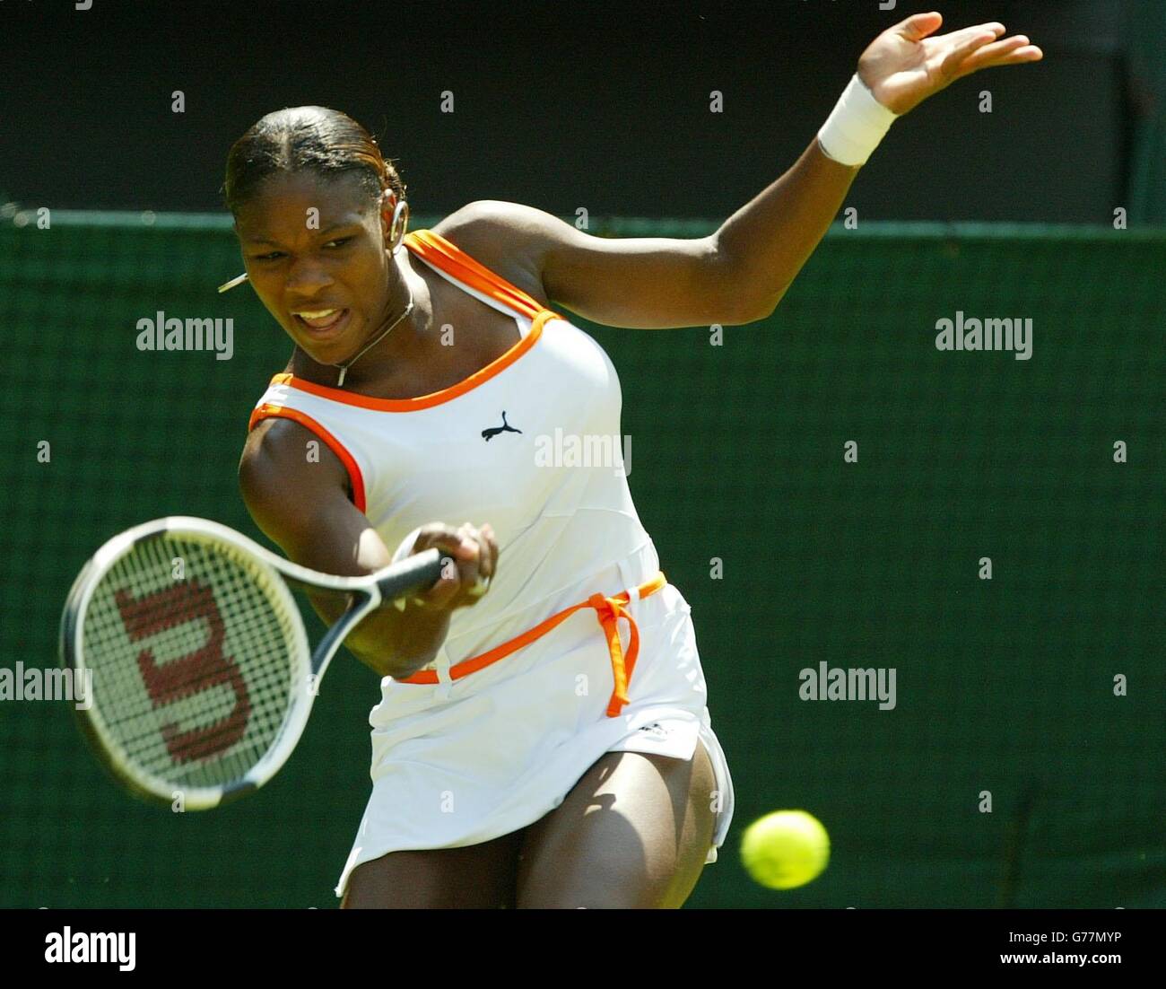 Defending champion Serena Williams in action on Centre Court against Jill Craybas from the USA at the All England Lawn Tennis Championships in Wimbledon. Williams defeated Craybas in straight sets 6-3, 6-3. Stock Photo