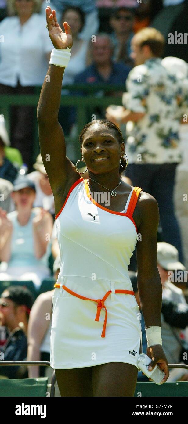 EDITORIAL USE ONLY, NO MOBILE PHONE USE. Defending champion Serena Williams waves to the spectators on Centre Court after defeating Jill Craybas from the USA at the All England Lawn Tennis Championships in Wimbledon. Stock Photo
