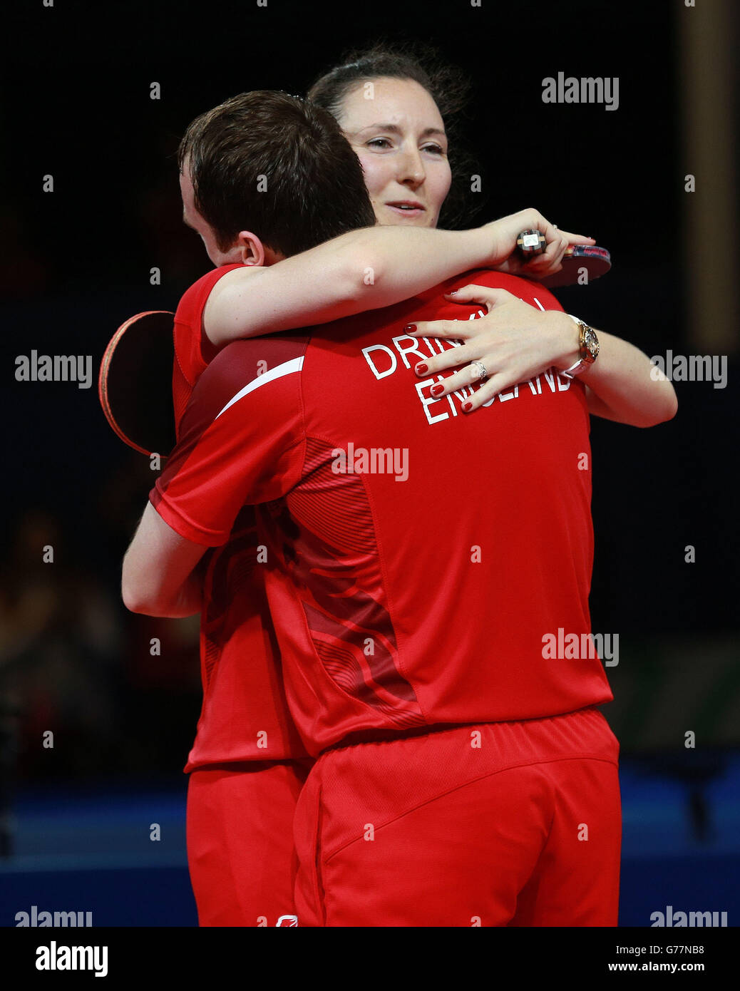 England's Joanna and Paul Drinkhall celebrate winning gold in the Mixed