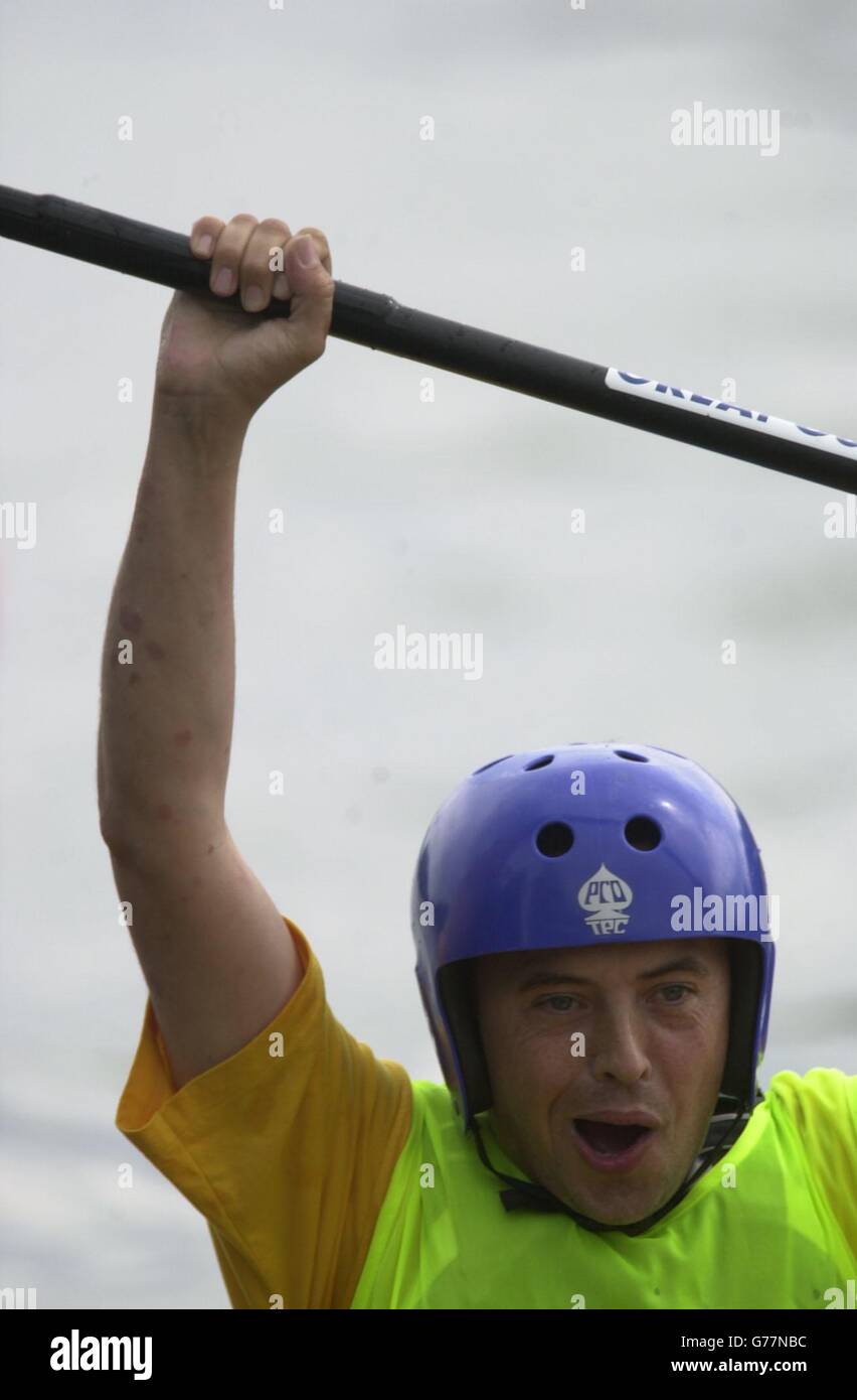 Irish kayaker David Dignam celebrates winning his race in the