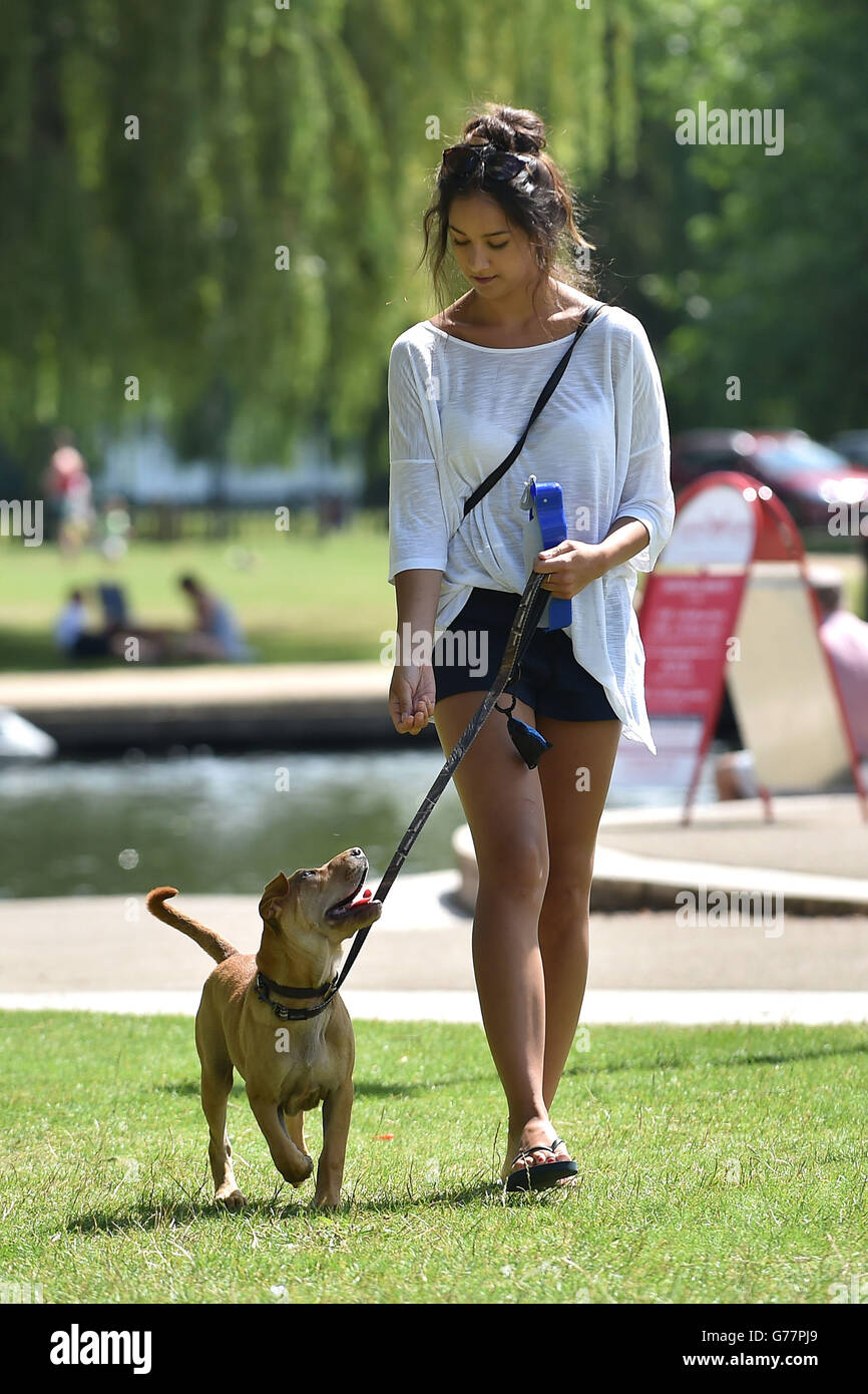 Ellie Gill, 19 from Stratford walks her dog Paddy along the banks of
