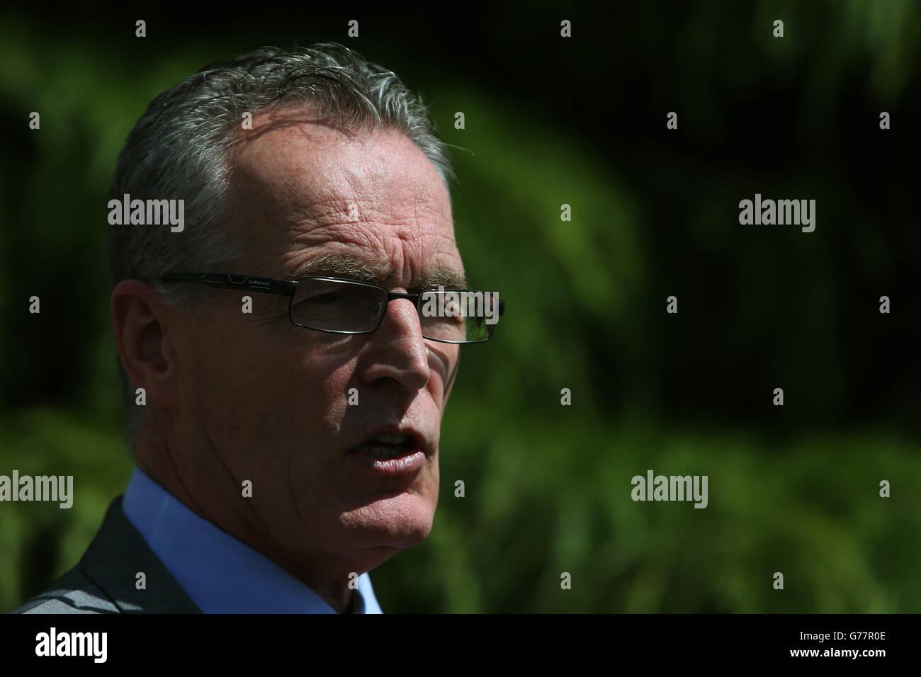Sinn Fein's Gerry Kelly speaks to the media outside the Stormont Hotel, Belfast, following the publishing of the Hallet Review into controversial amnesties for on the run prisoners from Northern Ireland. Stock Photo