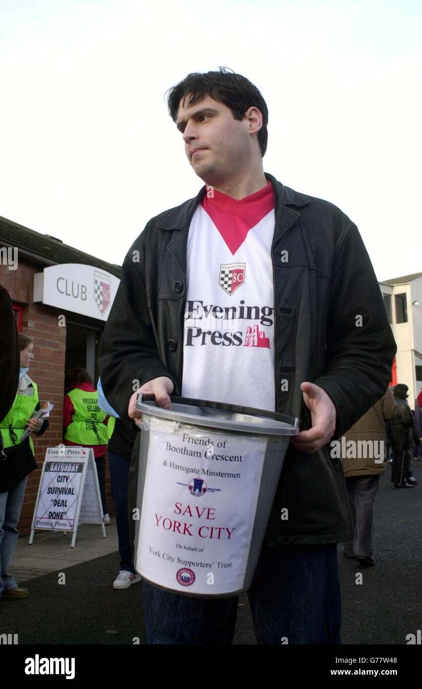 A York City supporter raises cash in an attempt to prolong the life of the cash-strapped club before their Nationwide Division Three match against Swansea at Bootham Crescent. NO UNOFFICIAL CLUB WEBSITE USE. Stock Photo