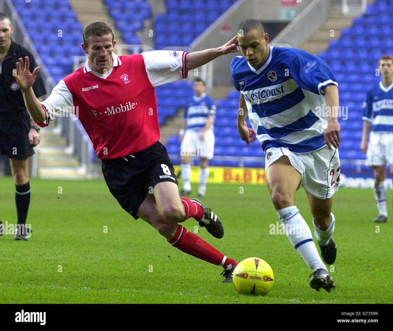 Reading's Nathan Tyson (right) and Rotherham's Chris Swayles, during their Nationwide Division One match at Reading's Madejski Stadium. NO UNOFFICIAL CLUB WEBSITE USE. Stock Photo