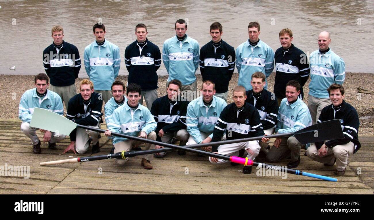 The Oxford and Cambridge (light blue) boat crews for the 2003 Varsity Boat Race - Back row: Robin Bourne-Taylor (Ox), Tom James (Cam), Basil Dixon (Ox), Alex McGarel-Groves (Cam), Henry Morris (Ox), Kris Coventry (Cam), Sam McLennan (Ox) and Wayne Pomman (Cam). *..- Middle Row: Hugo Mallinson (Cam), David Livingston (Ox), James Livingston (Cam), Matt Smith (Ox), Tim Wooge (Cam), Scott Frandsen (Ox), Matthias Kleinz (Cam) and John Adams (Ox). - Front Row: Jim Omartian (Cam) and Acer Nethercott (Ox) line-up on the tideway at Putney, London, ahead of their Boat Race next month. Stock Photo