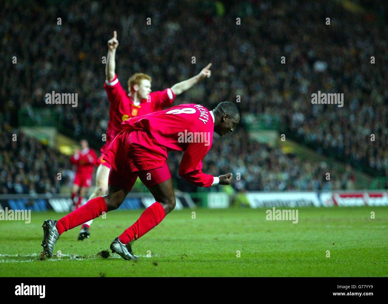 Liverpool's Emile Heskey celebrating his goal against Celtic, during their UEFA Cup quarter-final 1st leg match at Celtic Park, Glasgow. Stock Photo