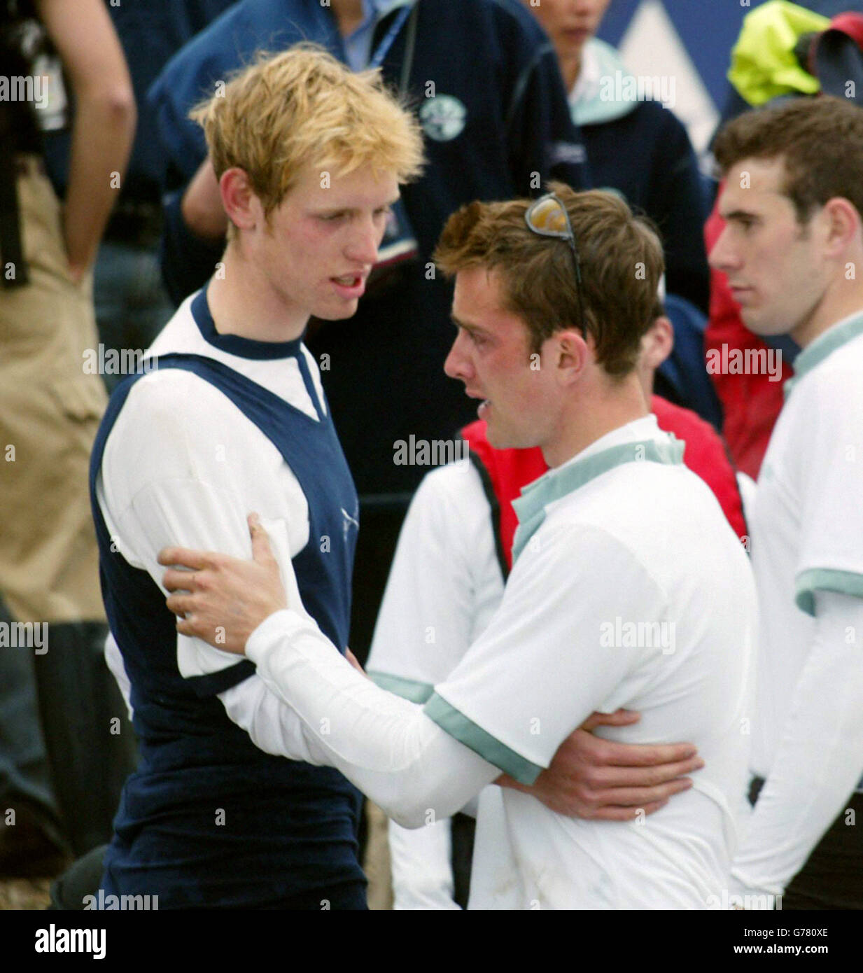Oxford's David Livingston (L) consoles brother James in the Cambridge Cambridge crew after the 149th Varsity Boat Race on the the River Thames. Stock Photo