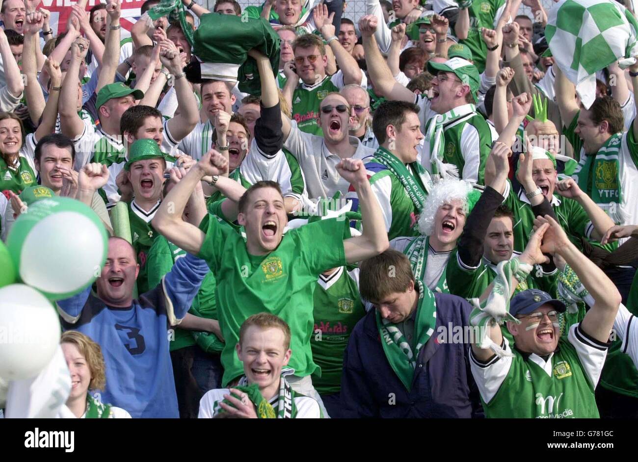 Yeovil supporters before their away game with Doncaster celebrate on hearing the news that Chester's draw with Woking guarantees their promotion to the Nationwide Football League before the Nationwide Conference match at Belle Veu, Doncaster. NO UNOFFICIAL CLUB WEBSITE USE. Stock Photo