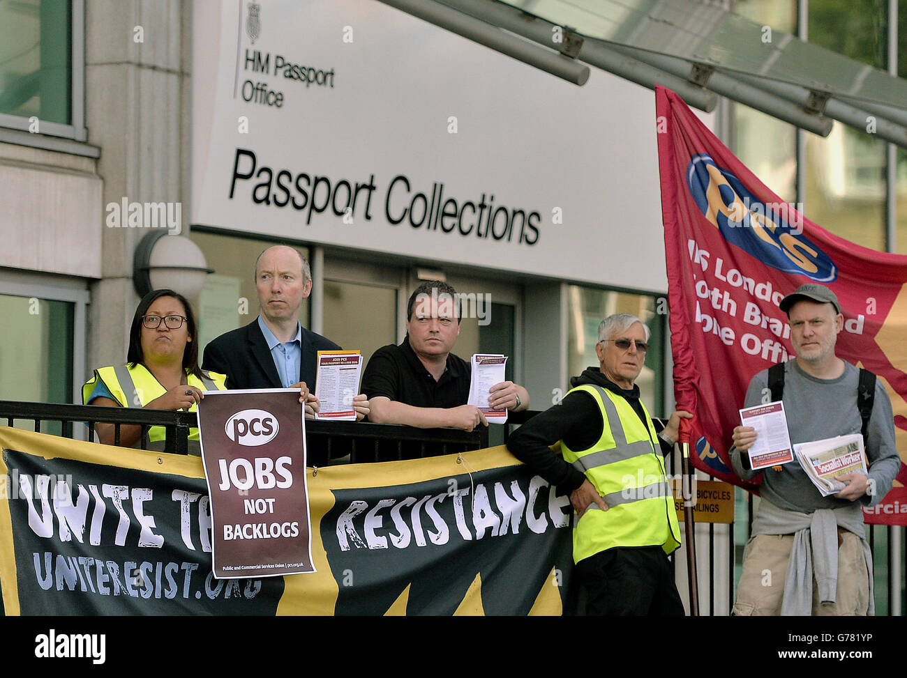 Workers outside the HM Passport office in Victoria, central London during a strike over staff shortages which they say have led to a serious backlog in processing applications this year. Stock Photo