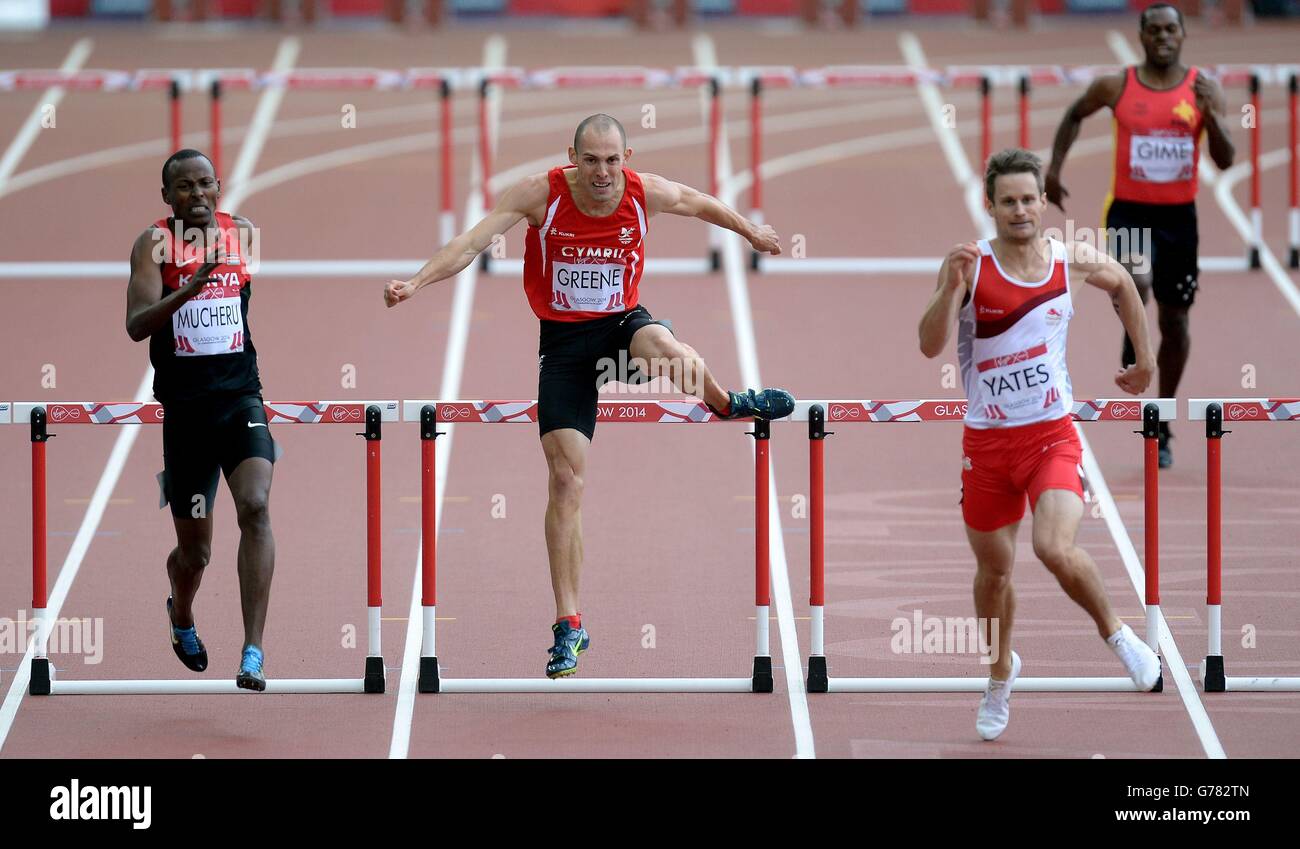 Wales' Dai Greene clears the final hurdle with England's Richard Yates