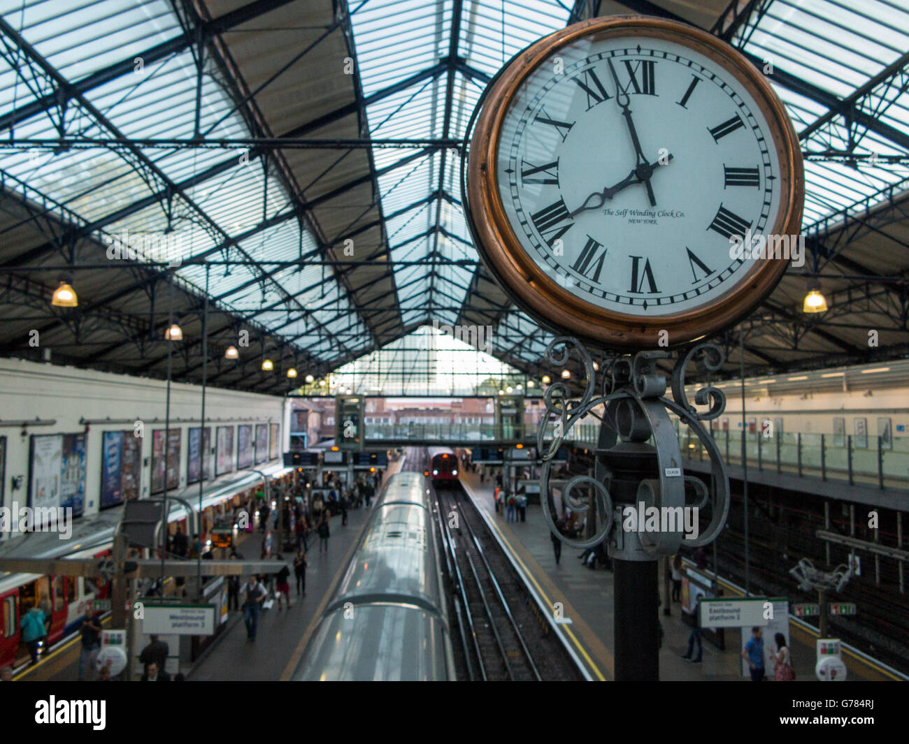 Earls Court tube station at 7.57 Stock Photo