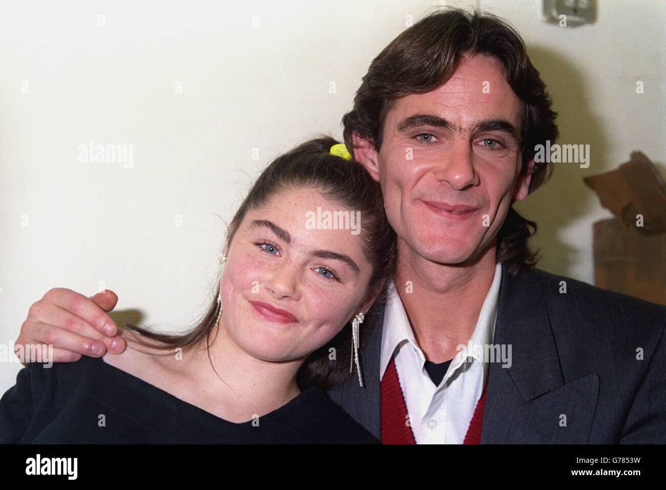 Paul Hill, one of the Guildford Four who were freed last week, with his daughter Kara, 14, after he was interviewed on Sky TV in London. Stock Photo