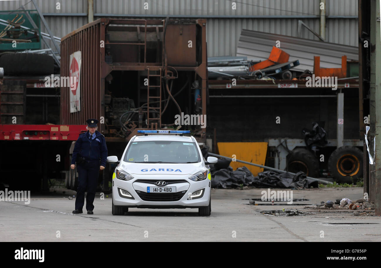 Gardai at the scene after a human leg was found at the Thornton's Recycling plant in west Dublin. Stock Photo