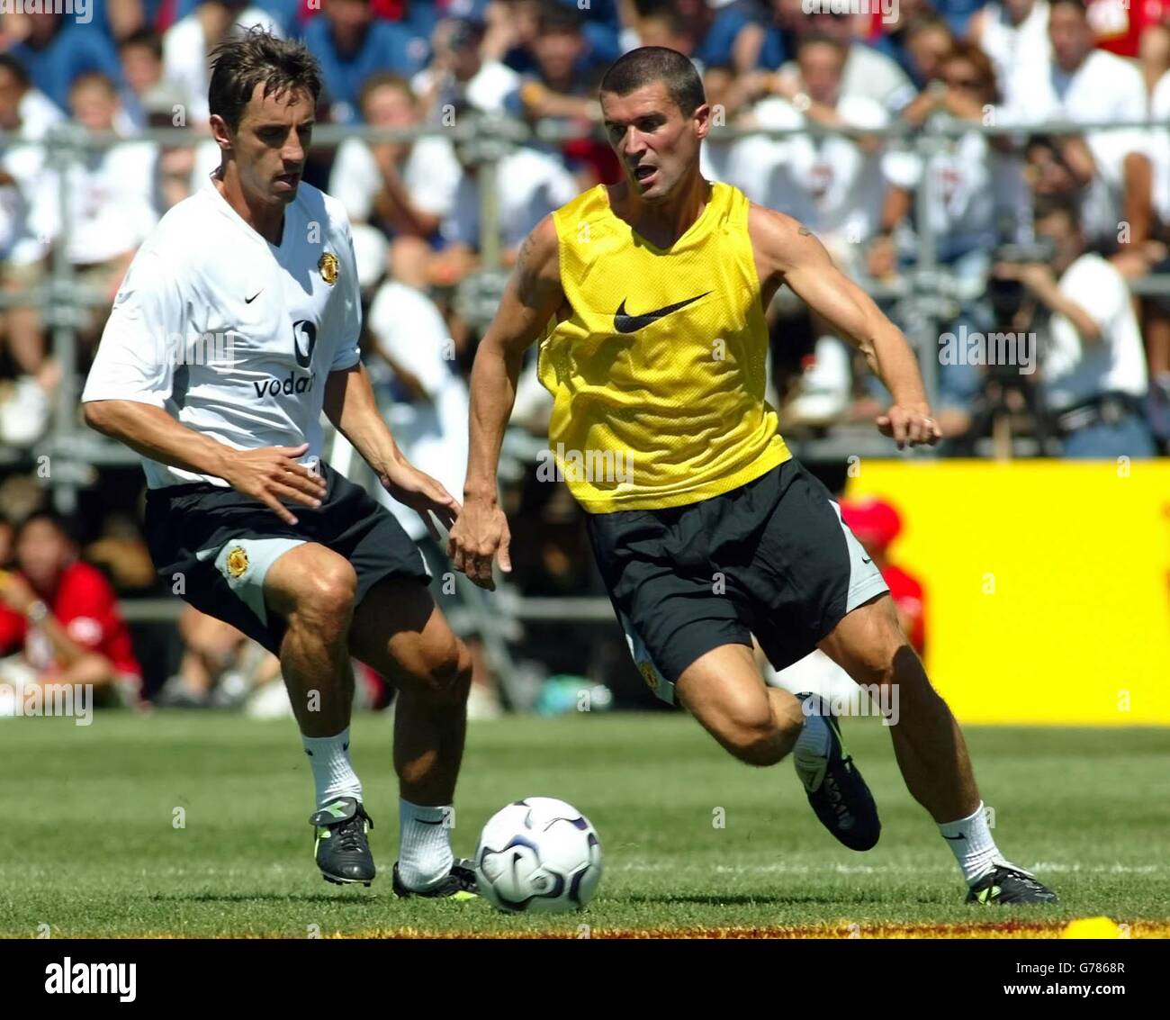 Manchester United's Roy Keane (Right) and Gary Neville training at the