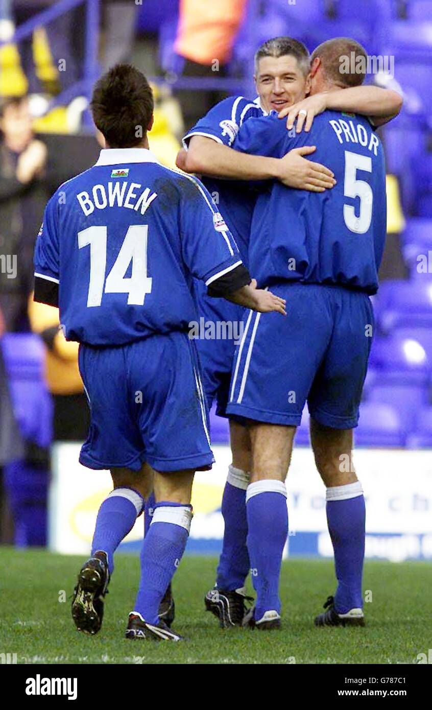 Cardiff City's Graham Kavanagh (centre) celebrates with team mates ...