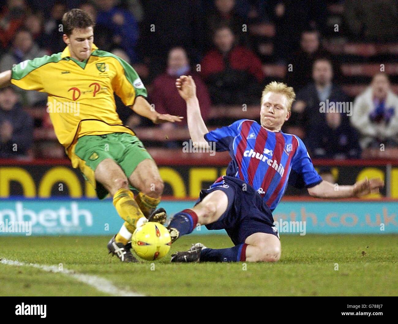 Norwich City's Adam Drury (L) challenges Crystal Palace's Aki Riihilahti during their Nationwide League Division One match at Crystal Palace's Selhurst Park ground in London. NO UNOFFICIAL CLUB WEBSITE USE. Stock Photo