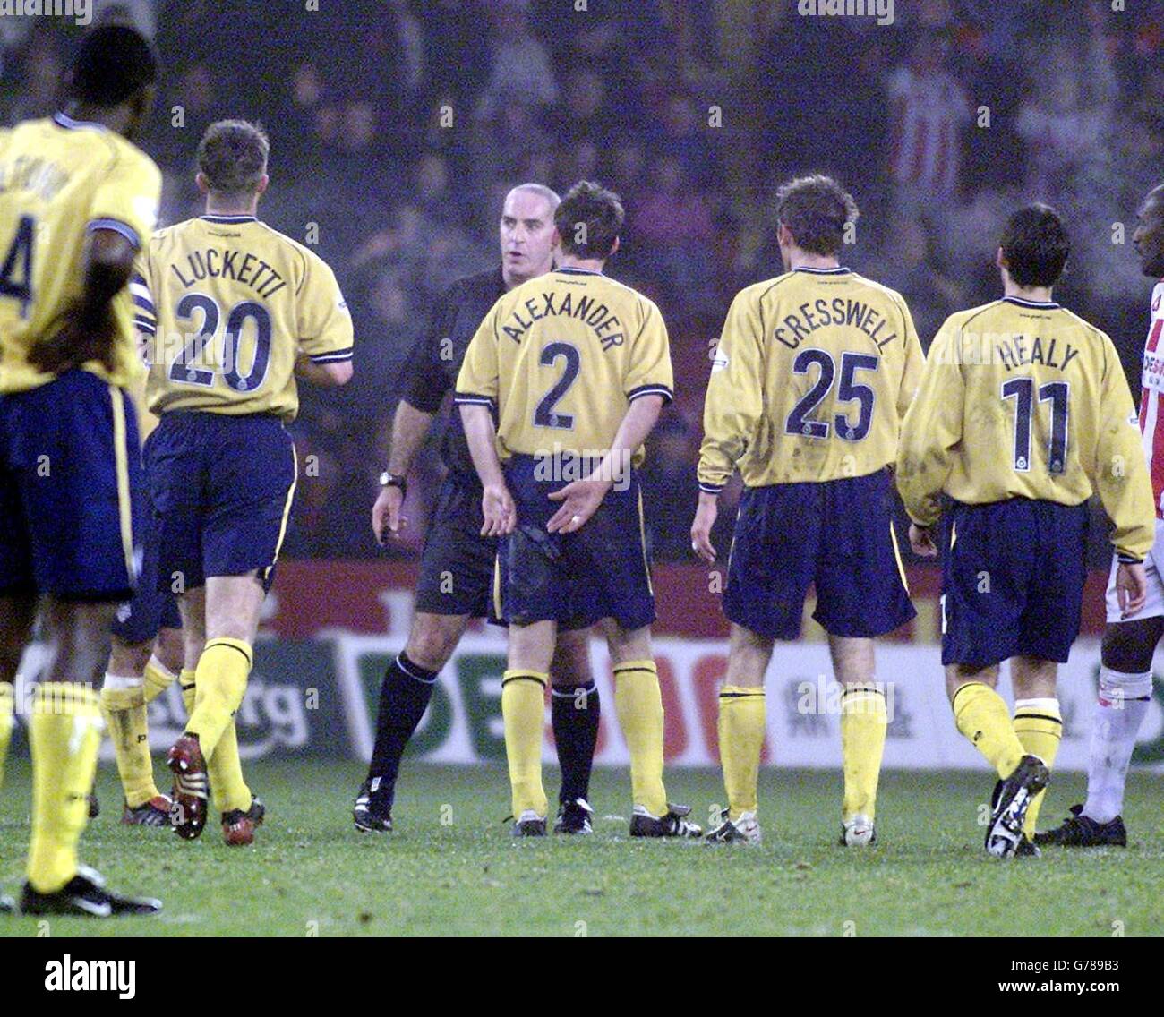 Preston players approach referee Frank Stretton after team mate Rankine is sent off against Sheffield United during their Nationwide Division One match at Sheffield's Bramall Lane ground. NO UNOFFICIAL CLUB WEBSITE USE. Stock Photo