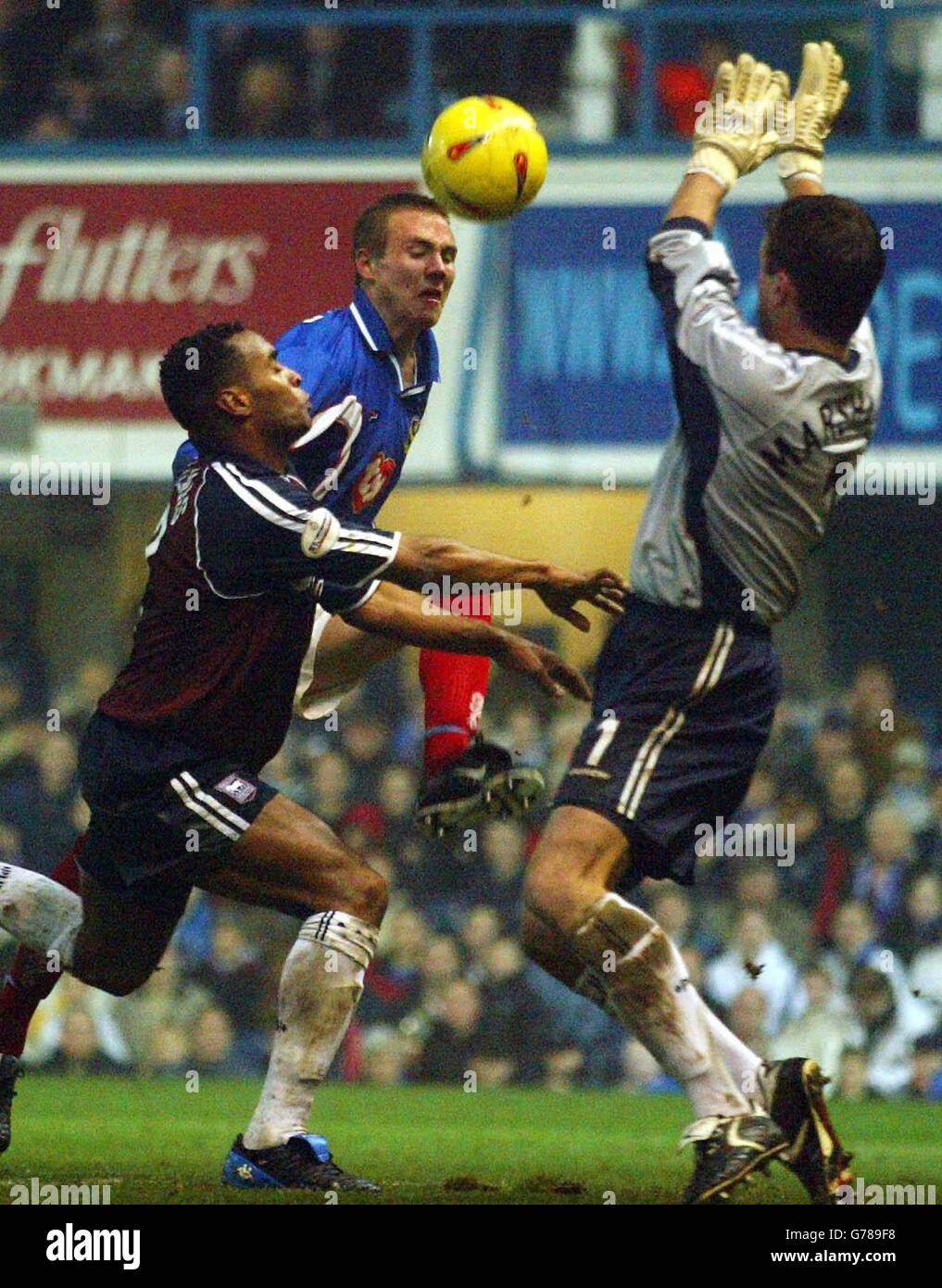 Portsmouth S Matthew Taylor Centre Heads The Ball Towards The Ipswich Town Goal Defended Fabien Wilnis And Keeper Andy Marshall During Their Nationwide Division One Match At Portsmouth S Fratton Park Ground Final Score