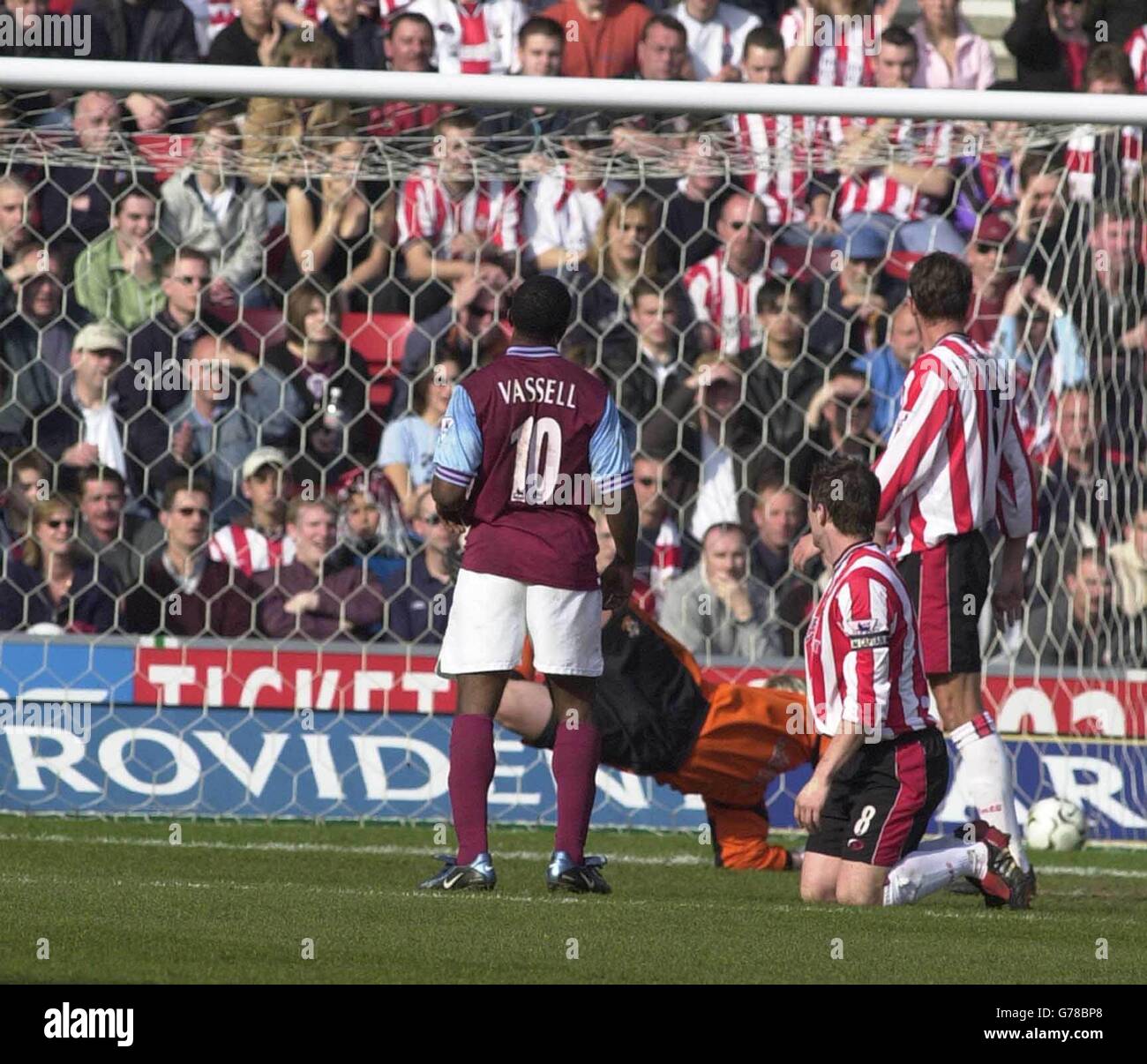 Aston Villa's second goal scorer Darius Vassell putting the ball in the Southampton net, during their FA Barclaycard Premiership match at St Mary's Stadium, Southampton. Stock Photo