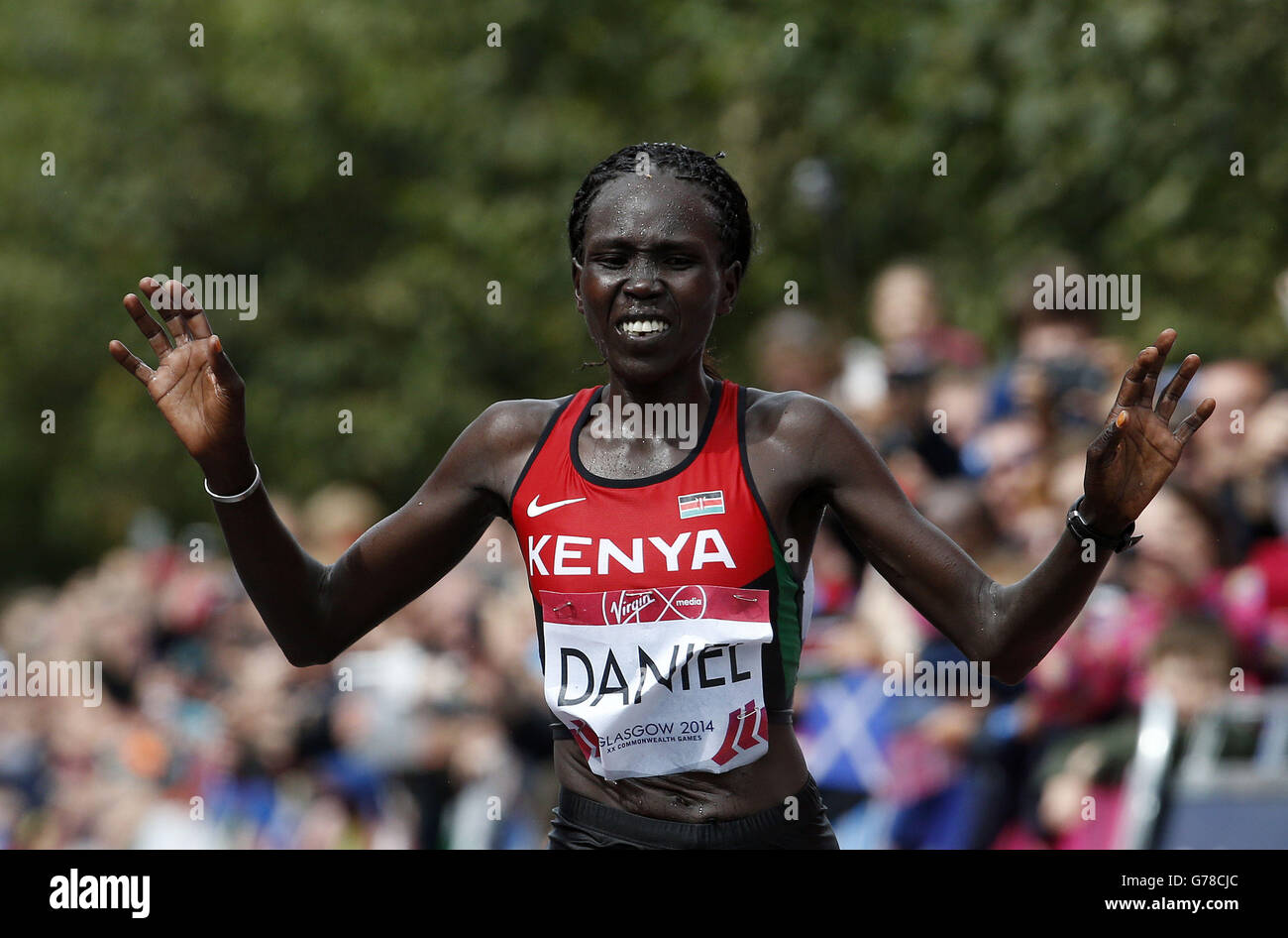 Sport - 2014 Commonwealth Games - Day Four. Kenya's Flomena Cheyech Daniel celebrates winning the women's marathon during the 2014 Commonwealth Games in Glasgow. Stock Photo