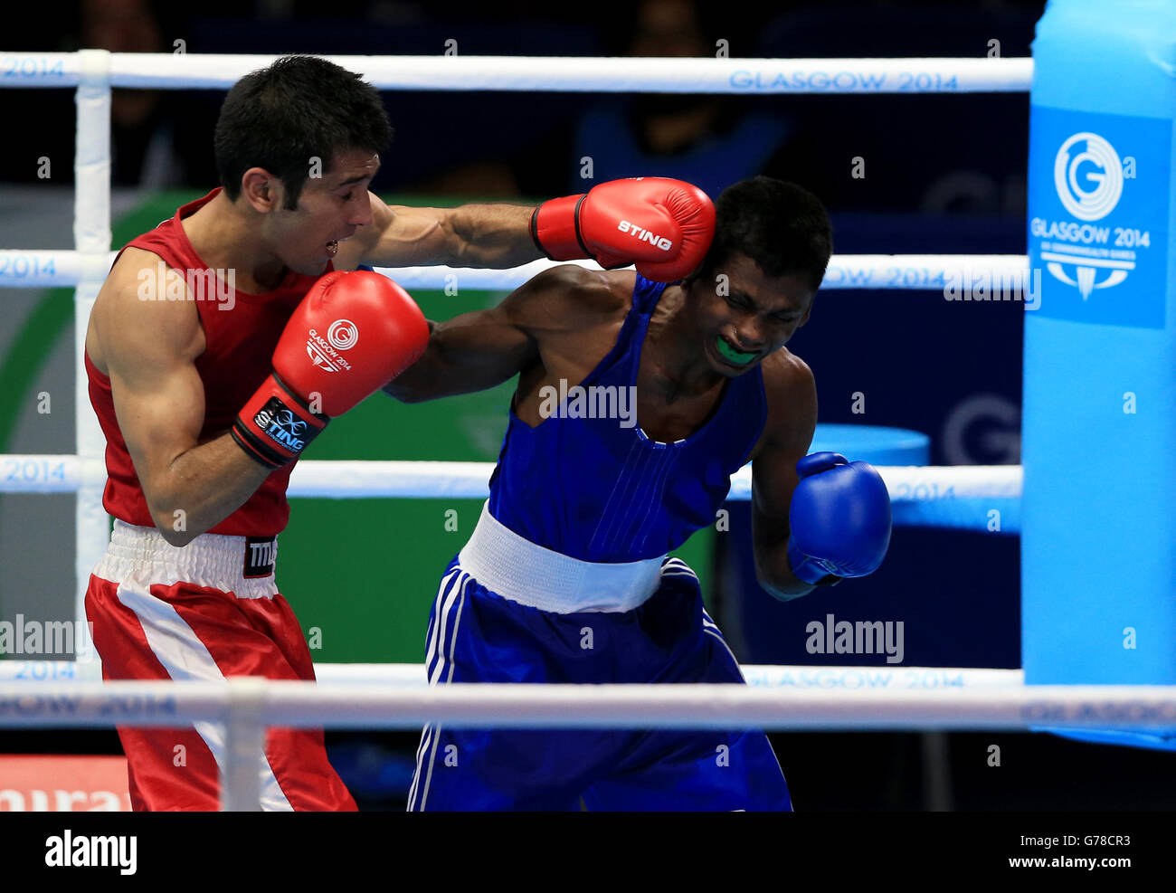 Jaya Raman Pakistan's Muhammad Waseem (left) in action against Malaysia's Jaya ...