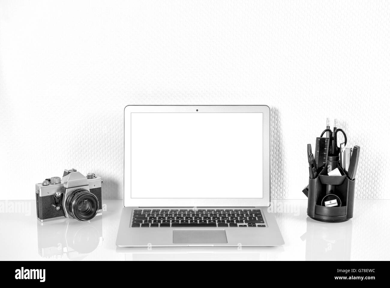 Working station with office supplies and analoge vintage Camera.  Workplace Mock Up with product display screen Stock Photo