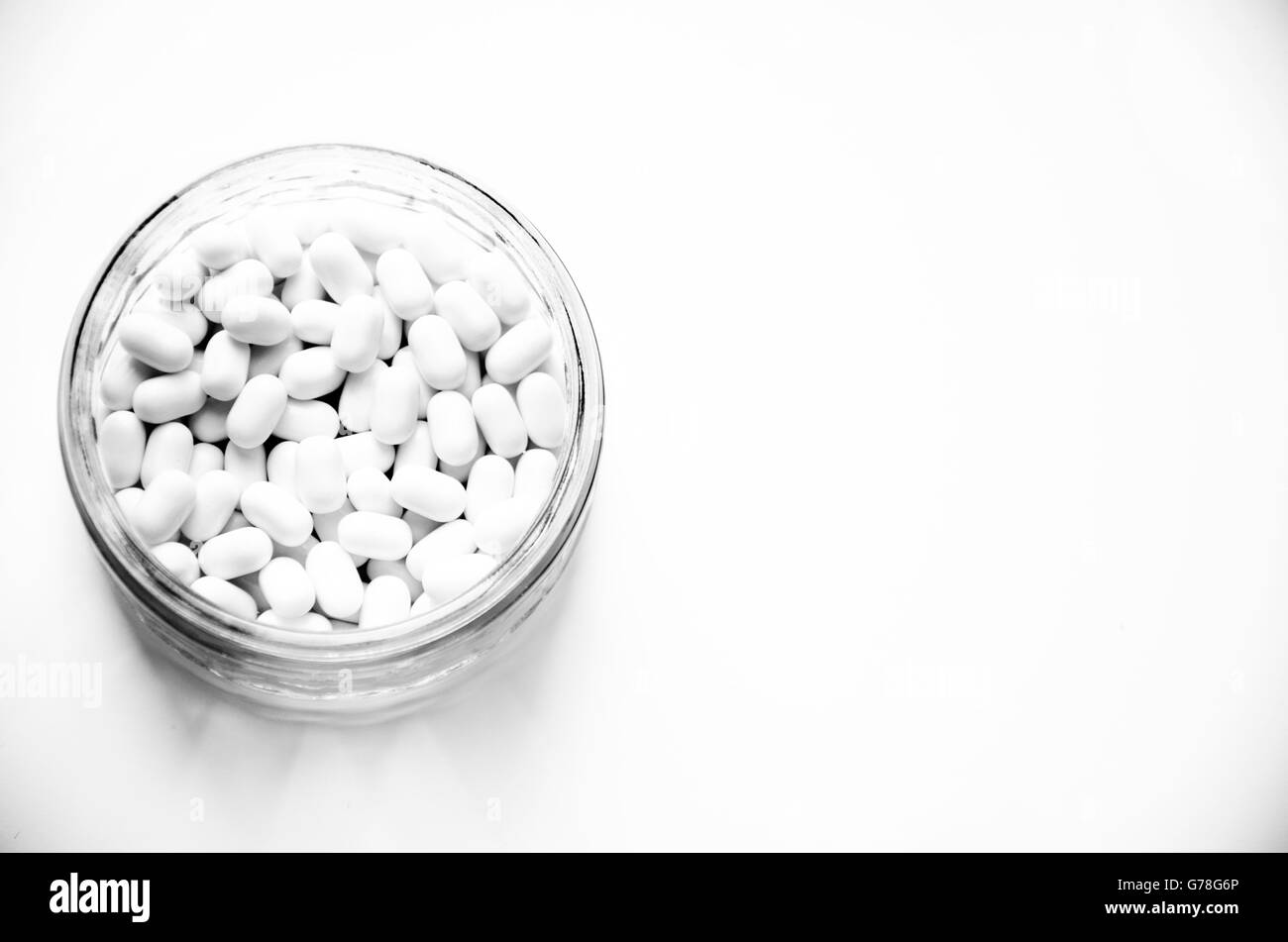 Monochrome pills in a dish Stock Photo