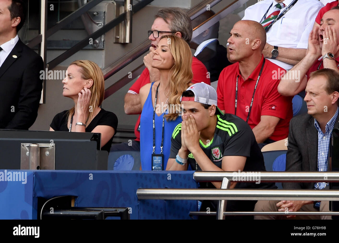Wife of Wales manager Chris Coleman Charlotte Jackson in the stands with his son Sonny during the round of 16 match at the Parc de Princes, Paris. Stock Photo