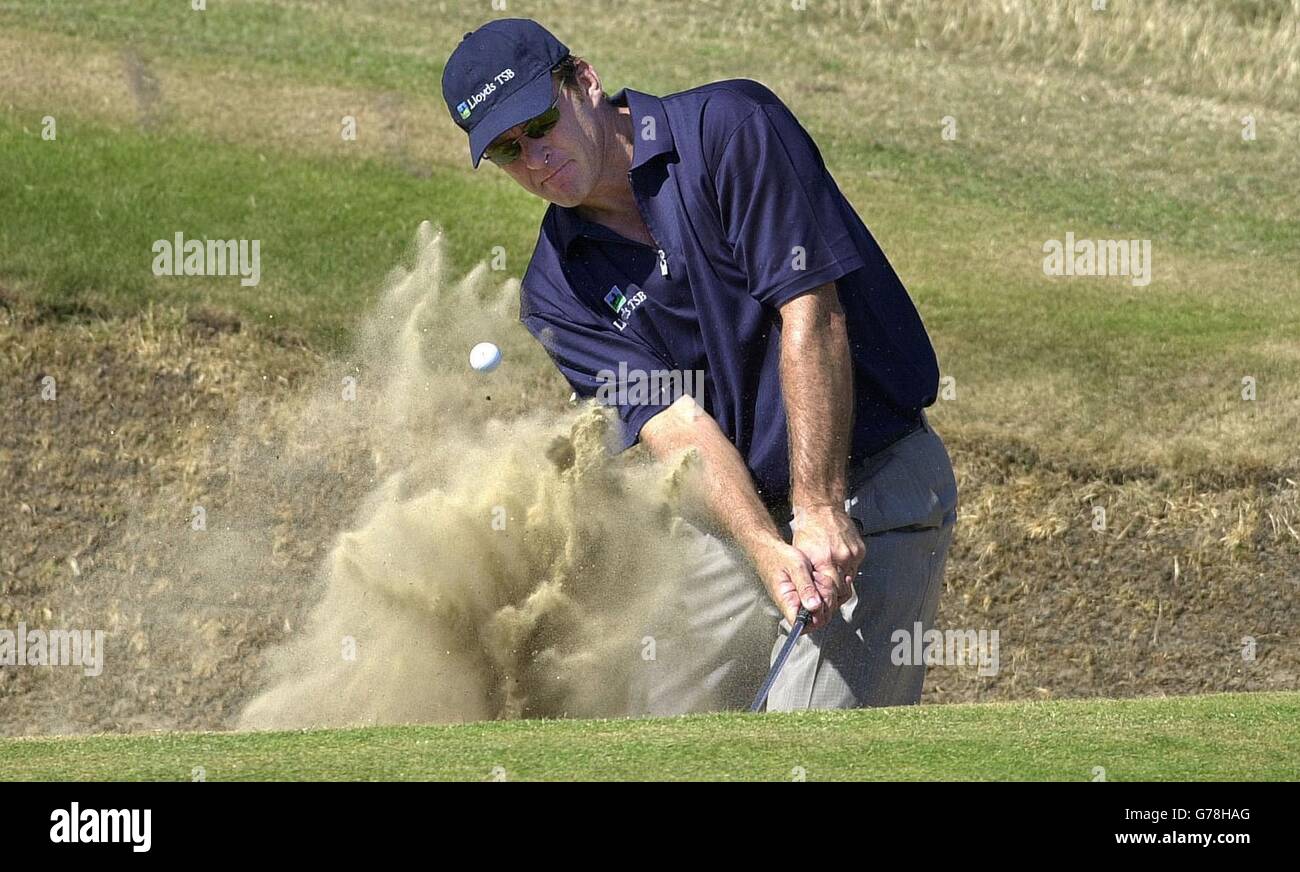 . NO MOBILE PHONE USAGE. England's Nick Faldo blasts out of a bunker during a practice round at Royal St George's, Sandwich, Kent, in preparation for the Open Championship. Stock Photo